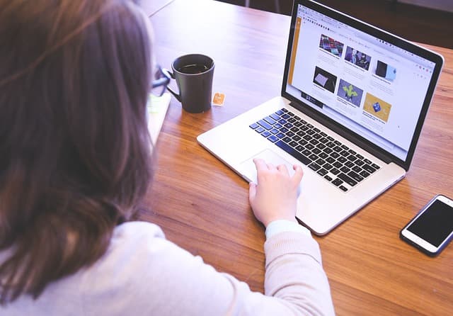 a woman working at a computer